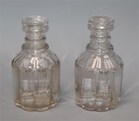 A pair of George IV pillar cut glass decanters, with lenticular effect height 22cm (no stoppers)